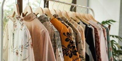 white and brown floral long sleeve shirt